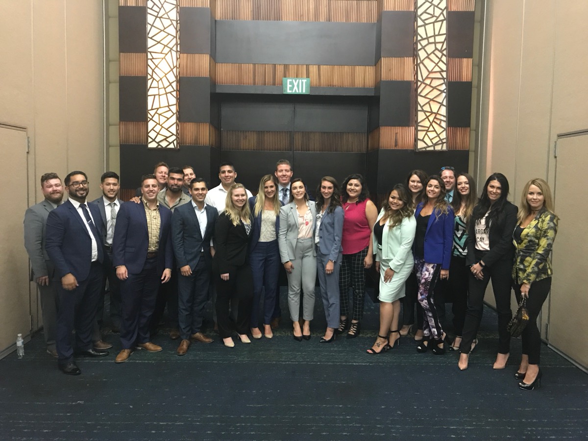 Ken Lear and his team at a Cydcor convention