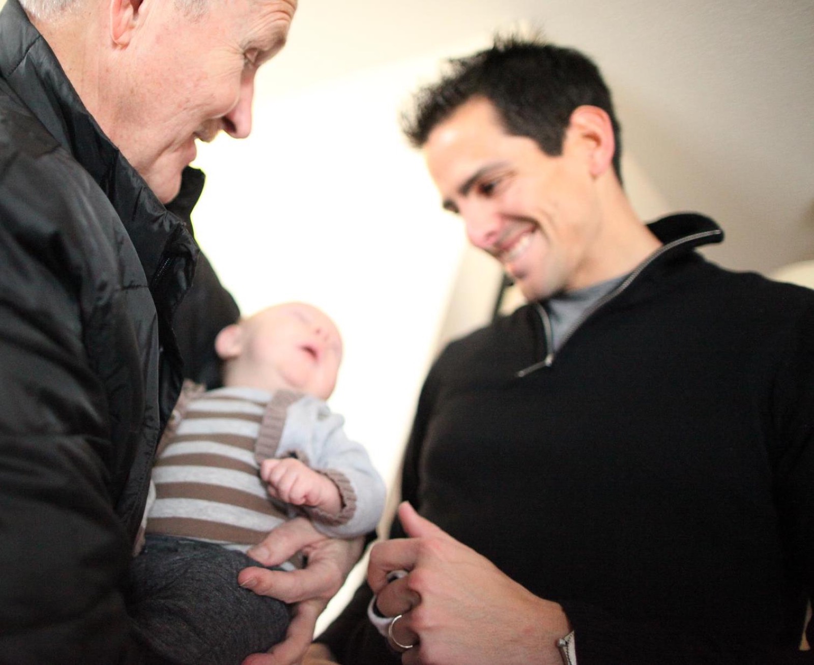 Ken Lear with his father and his newborn son
